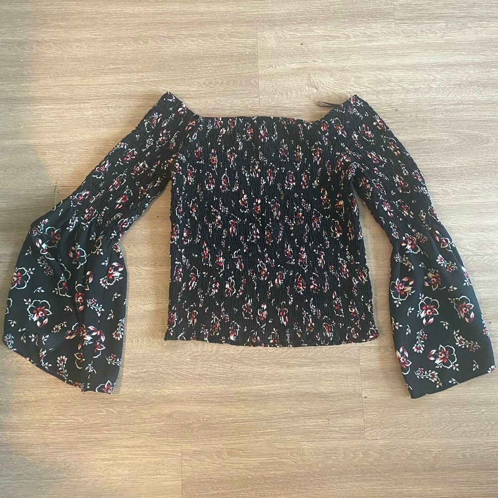 Express black 70s style bell sleeve fitted blouse